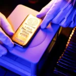 Золото стабілізувалося після падіння на тлі сигналів ФРС щодо інфляції